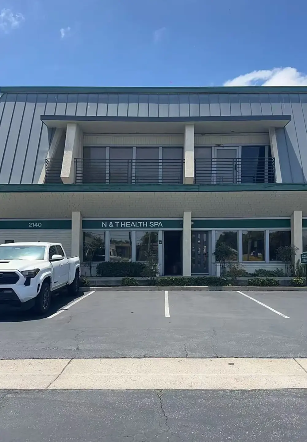 Storefront and building of N&T Health & Wellness Spa at 2140 W Chapman Ave in Orange CA